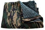 Camouflage blanket cover and emerald green on a white backgroud