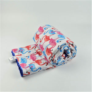 pink, blue and orange flamingo pattern weighted blanket by sensory owl